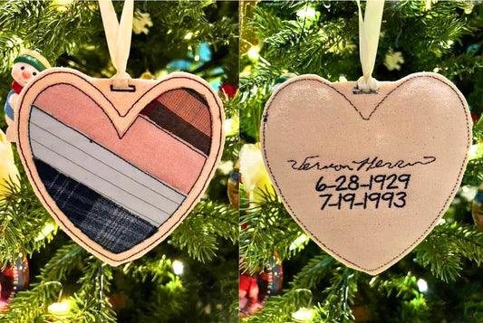 Heart-shaped ornament with 4 articles of clothing from a loved one and embroidered loved one's signature and birth/death date